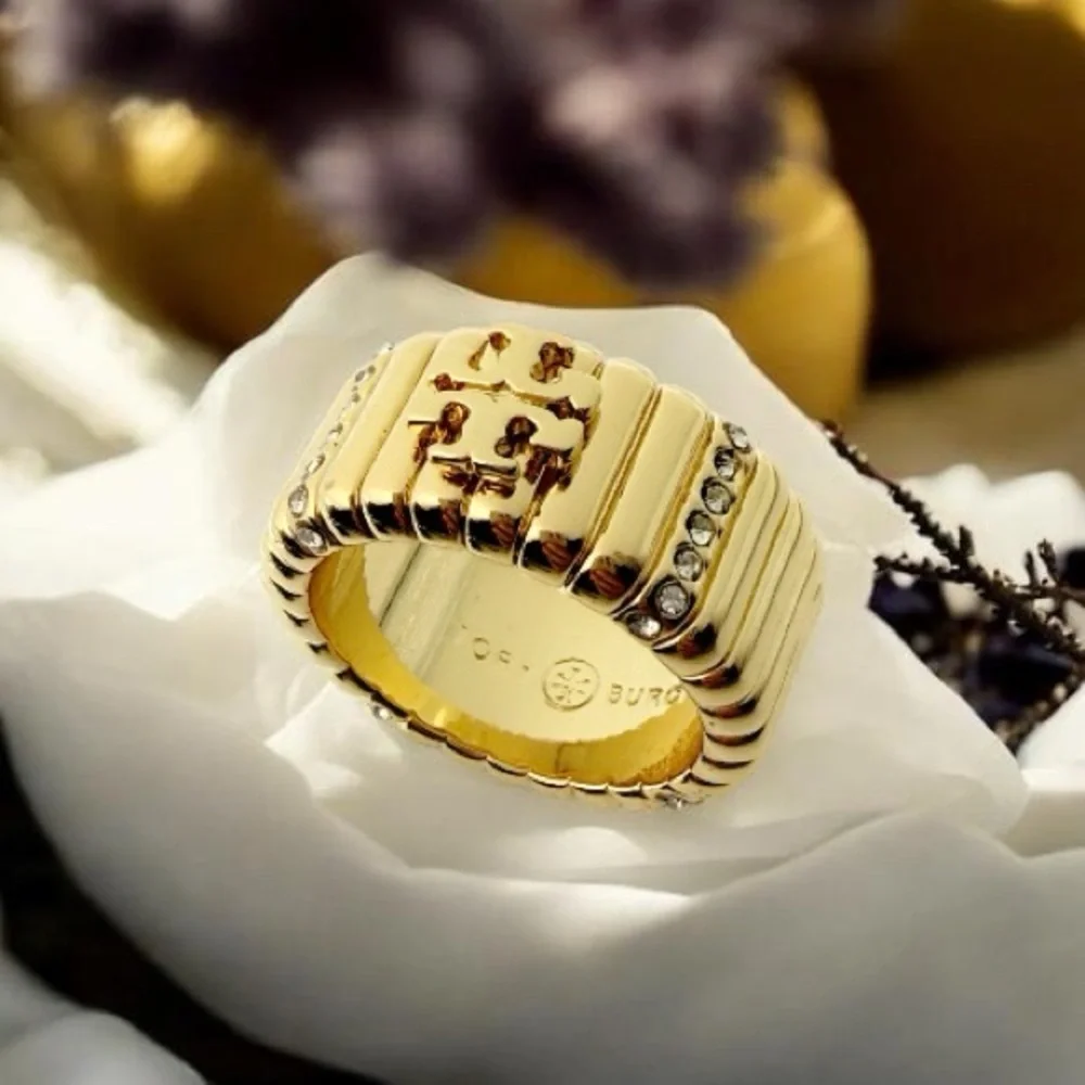 Tory Burch Crystal Textured Pave Logo Band Ring. Size 8